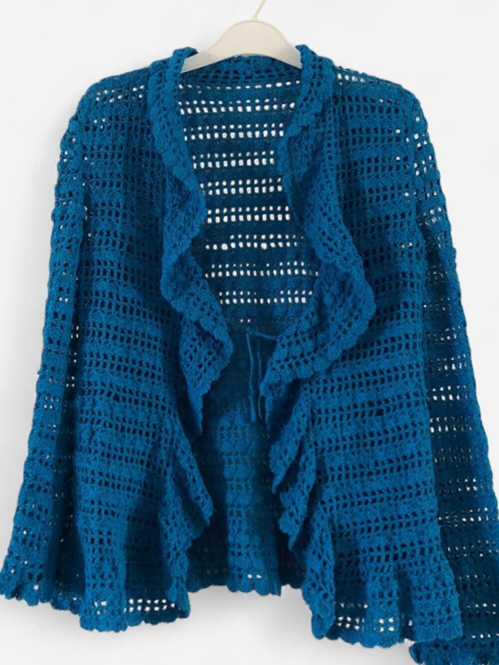 Blue crochet cardigan with ruffles
